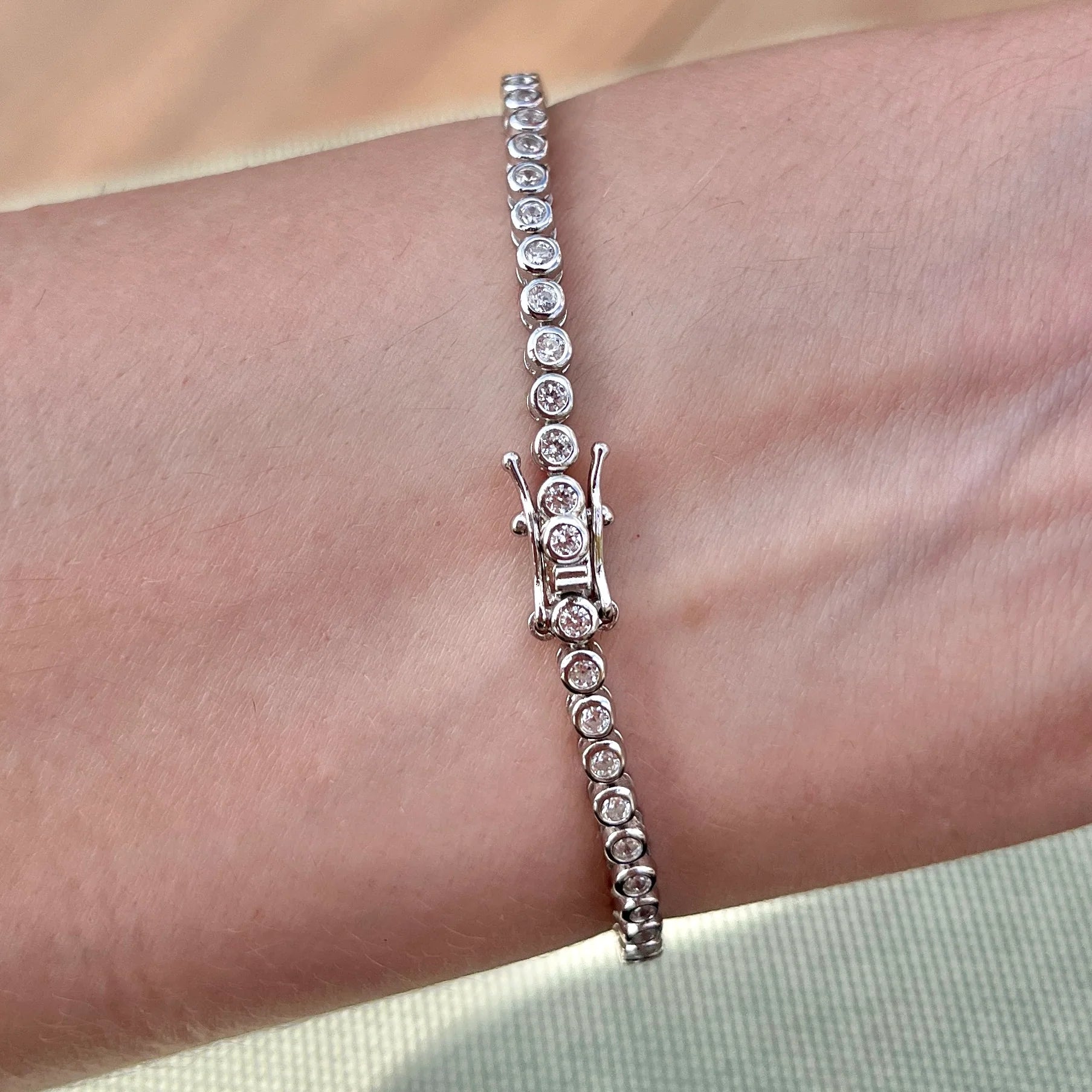 THE "POPPY" 2MM BEZEL TENNIS BRACELET