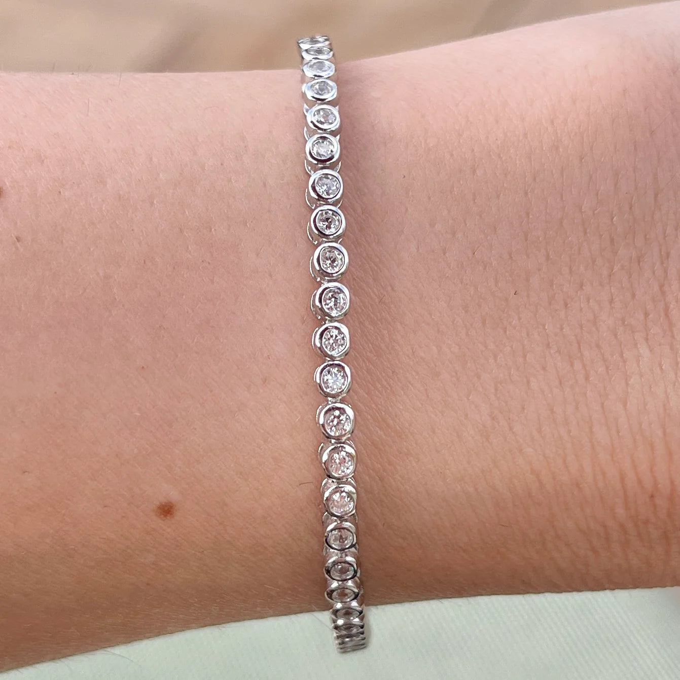 THE "POPPY" 2MM BEZEL TENNIS BRACELET