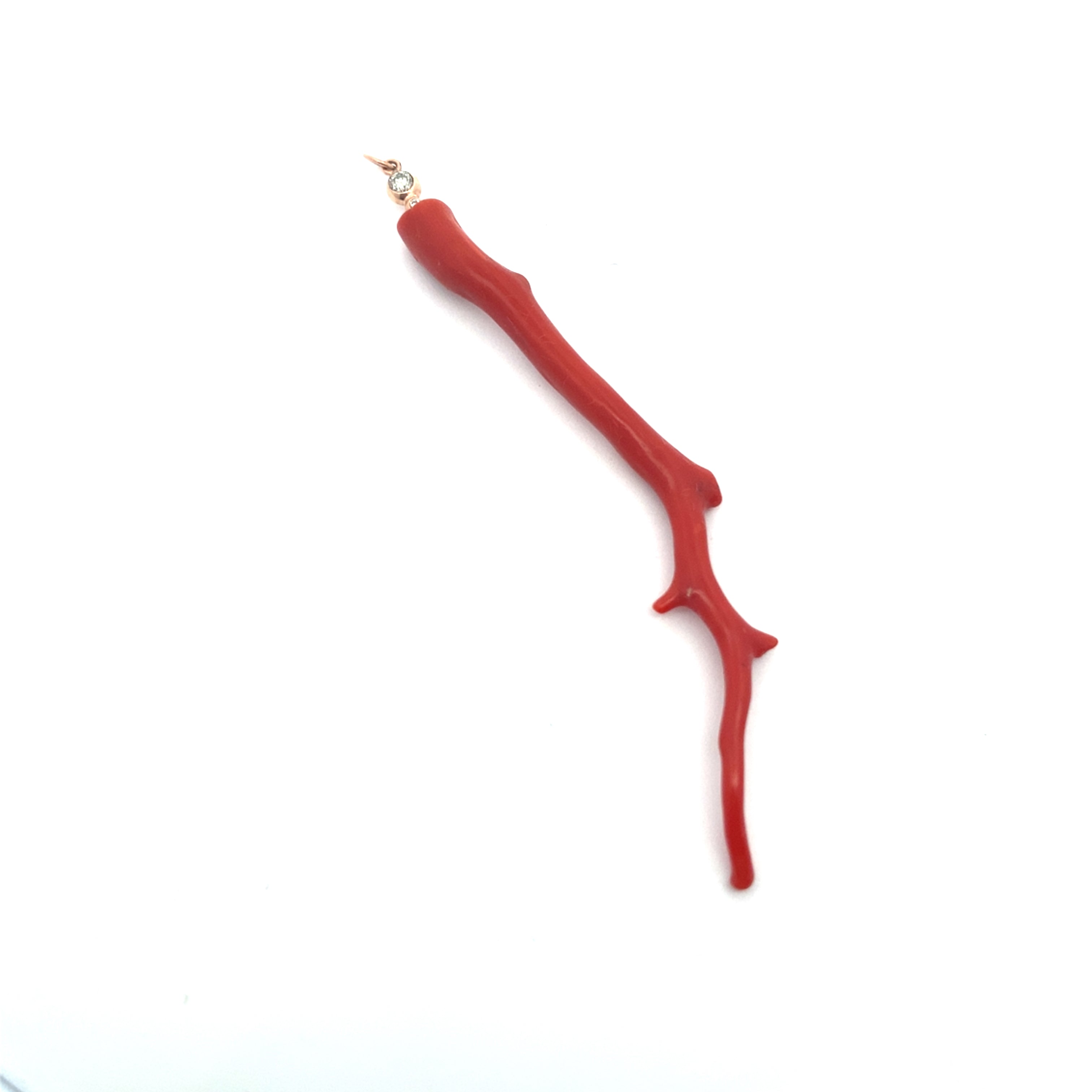 One of a kind long coral and diamond charm