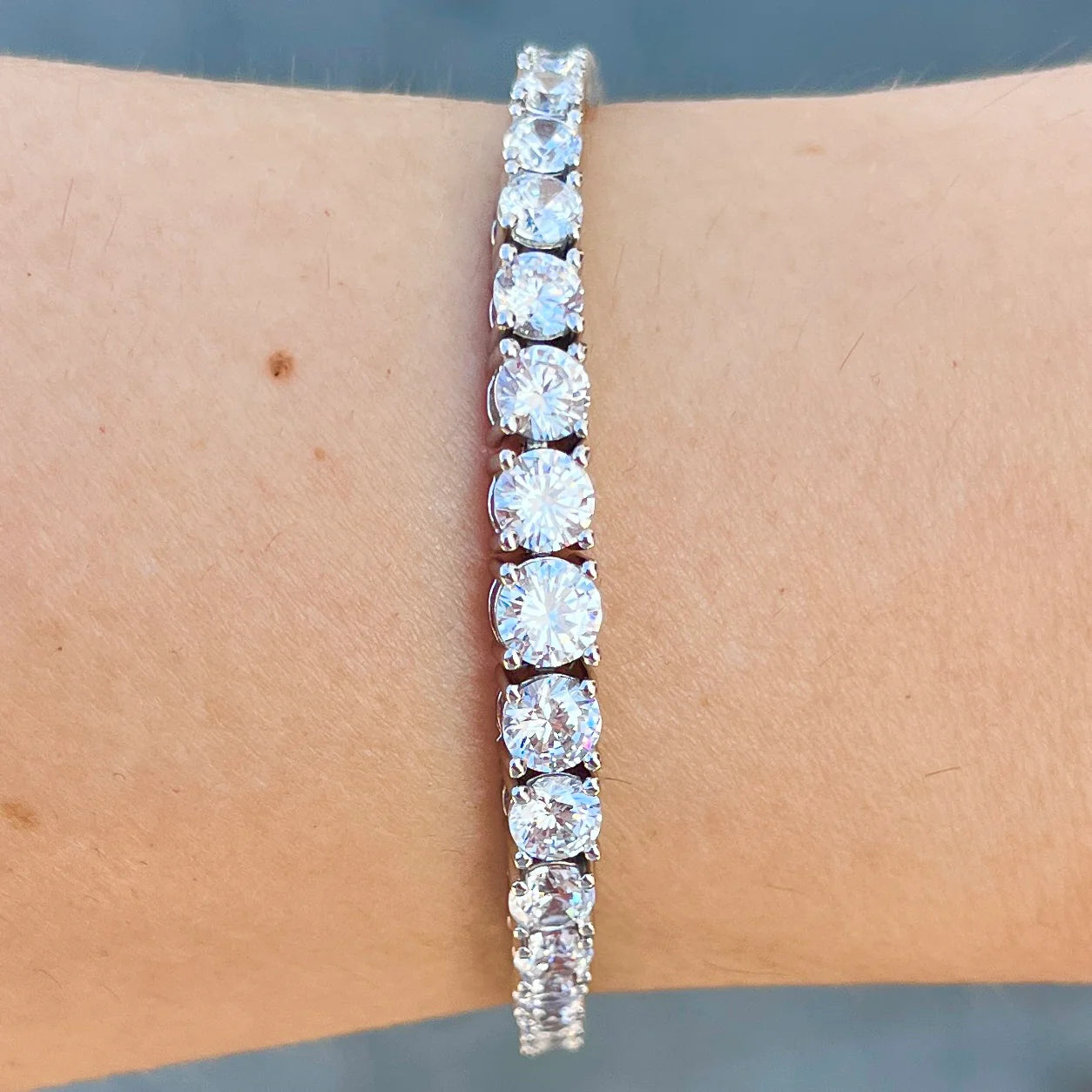 THE “JAIMIE” 4 PRONG GRADUATED TENNIS BRACELET