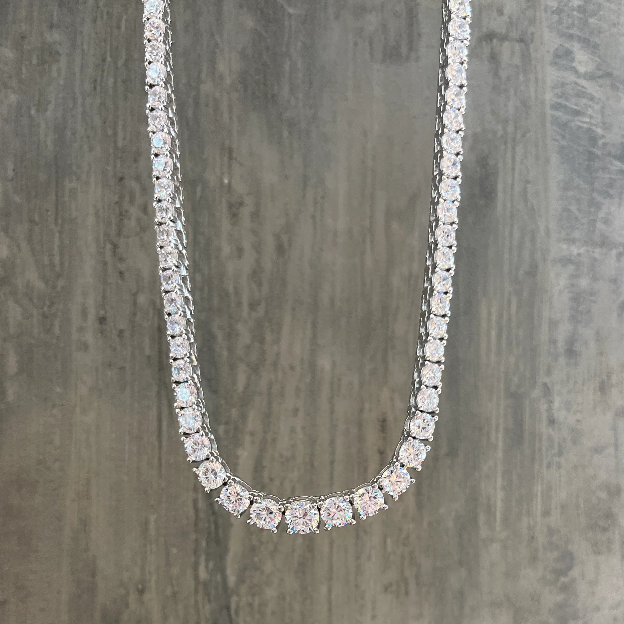 THE "JAIMIE" 4 PRONG GRADUATED TENNIS NECKLACE