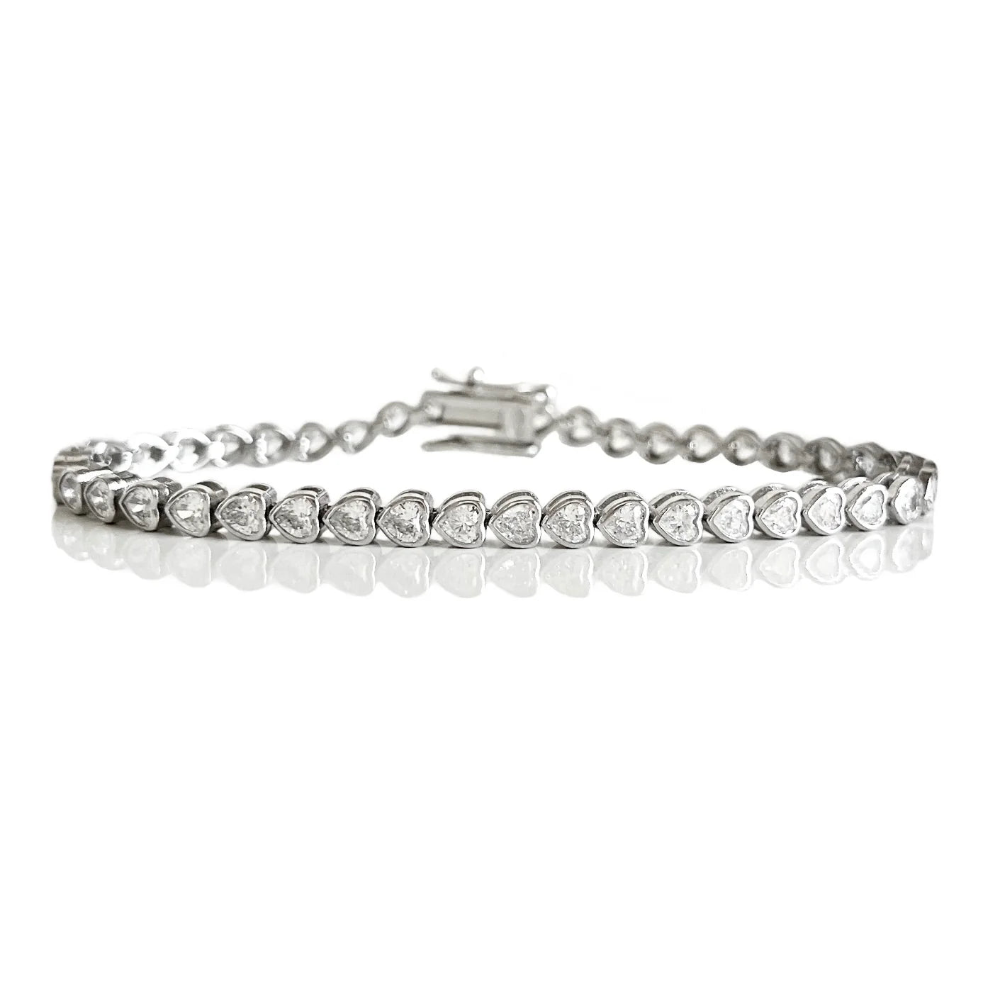 THE "MARIE" HEART BEZEL TENNIS BRACELET
