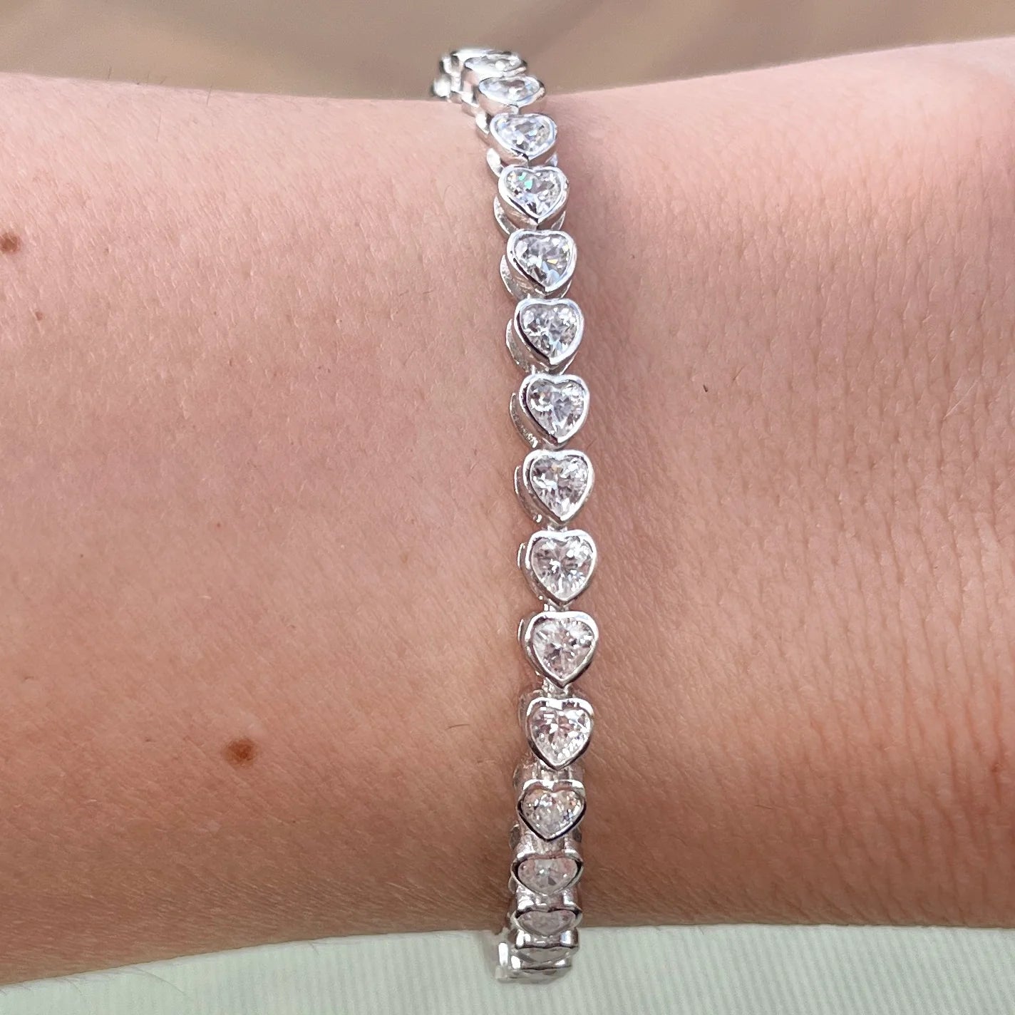 THE "MARIE" HEART BEZEL TENNIS BRACELET