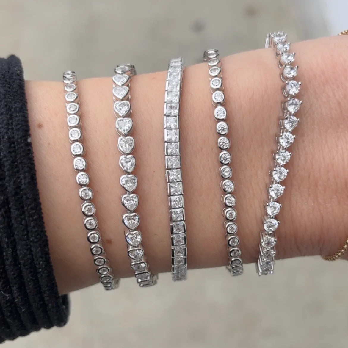 THE PRINCESS CUT CHANNEL SET TENNIS BRACELET