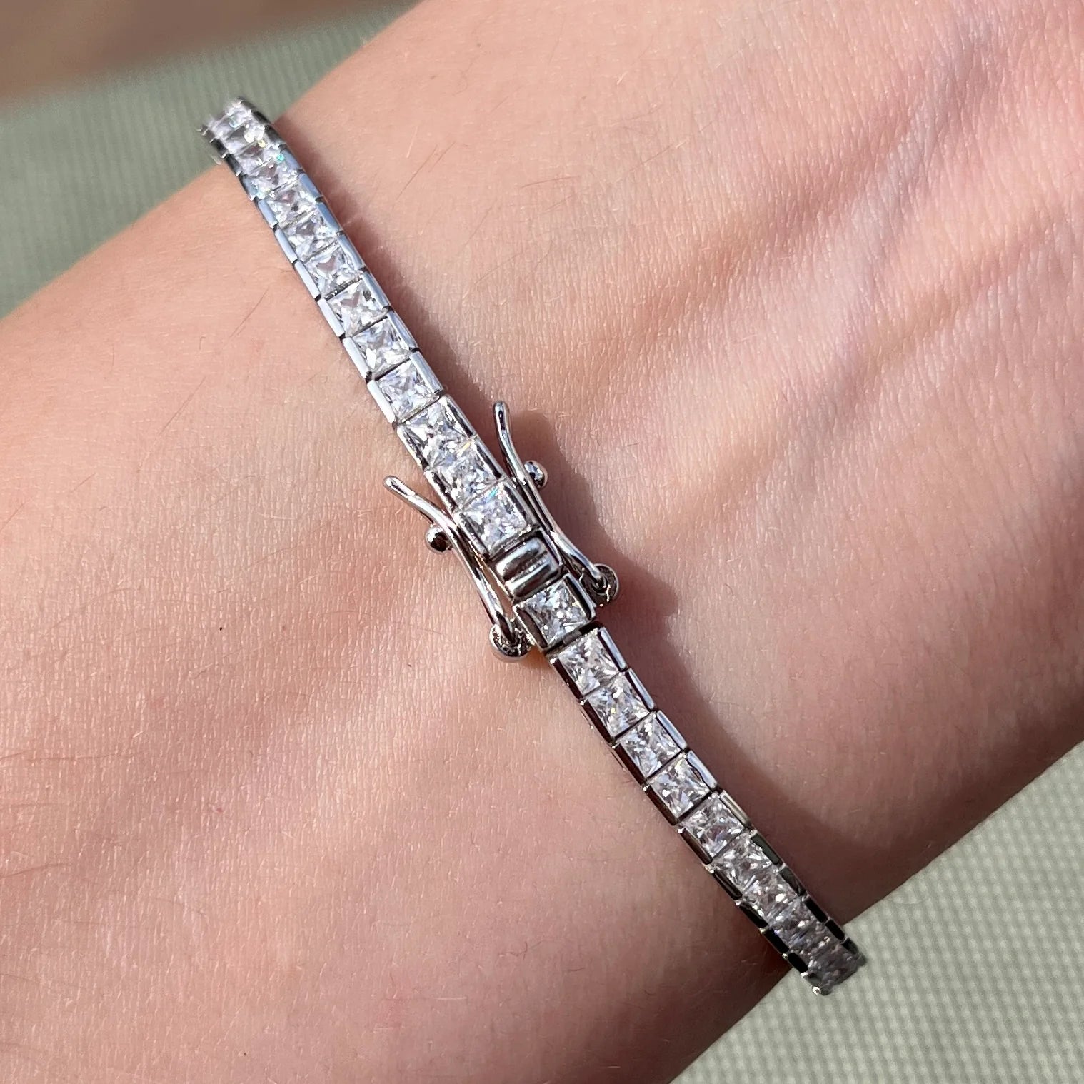 THE PRINCESS CUT CHANNEL SET TENNIS BRACELET