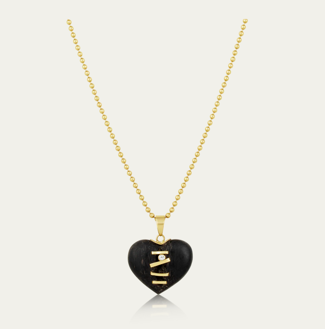 Carved Ebony Stitched Heart Pendant