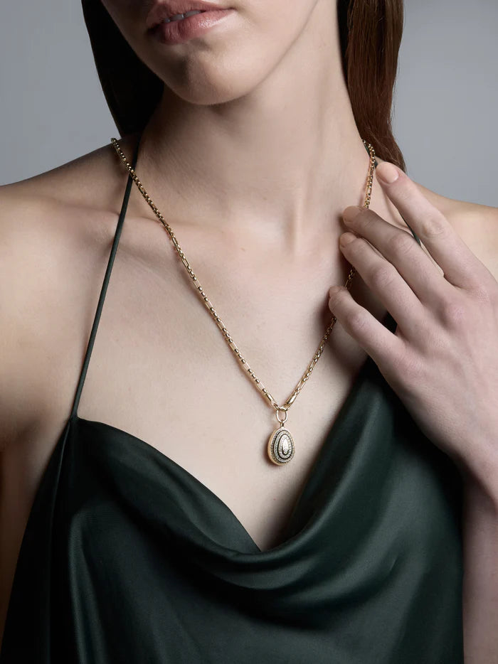 Cosmic egg diamond orbit locket