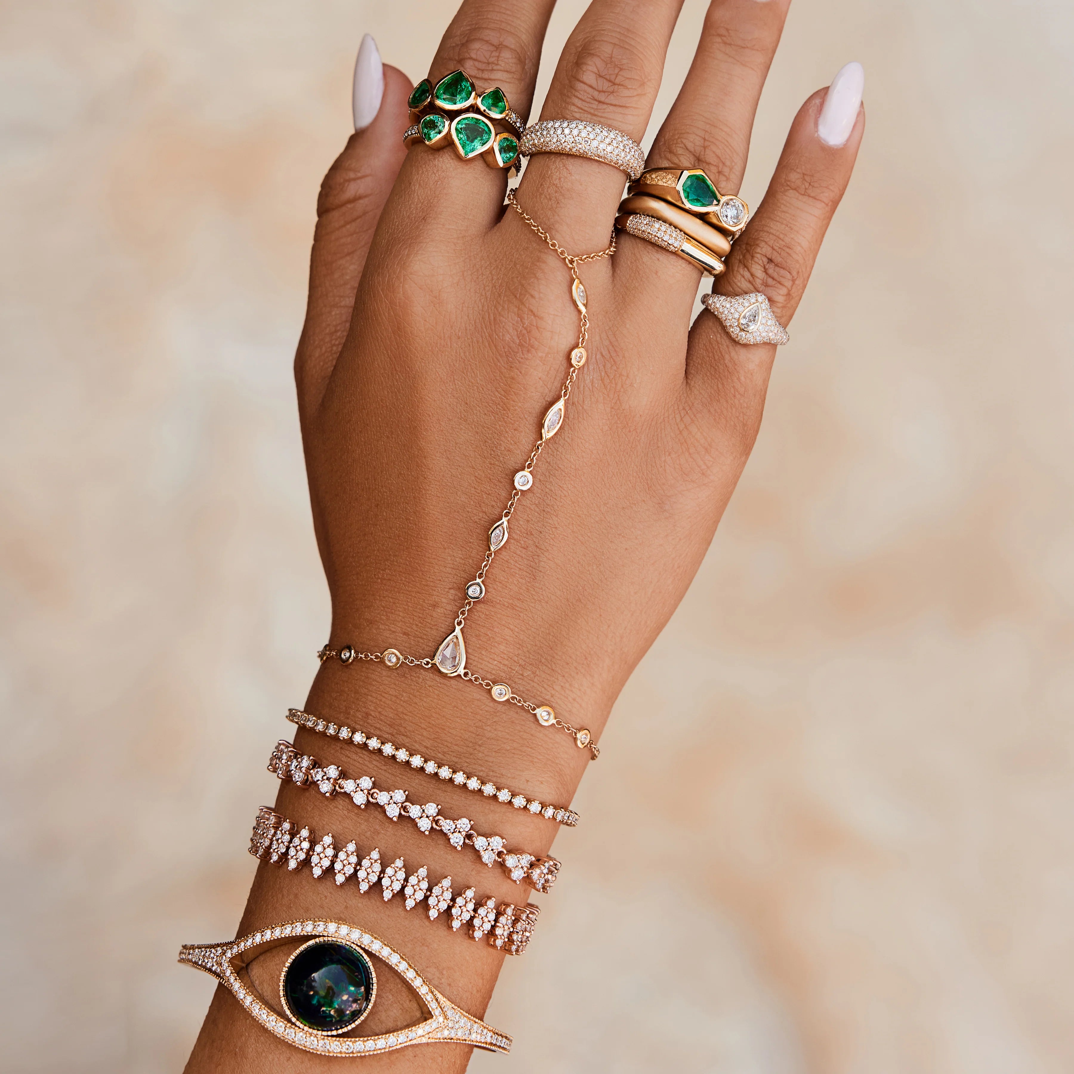 ROSE CUT TEARDROP DIAMOND CENTER, ROUND + MARQUISE ALTERNATING FINGER BRACELET