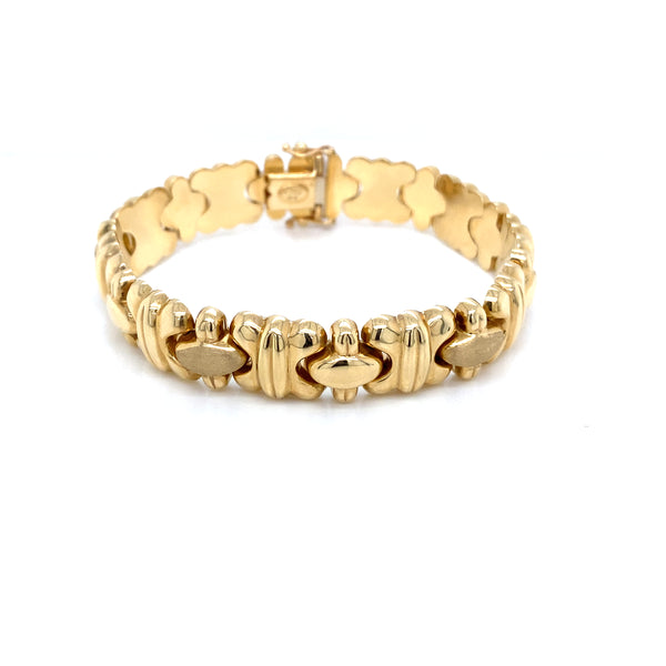 14k yellow gold fancy link bracelet with high and brushed polish finish