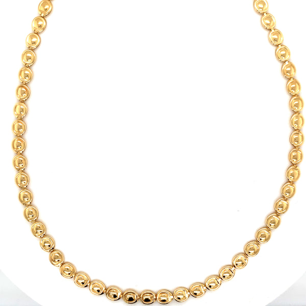 Yellow gold circular design necklace