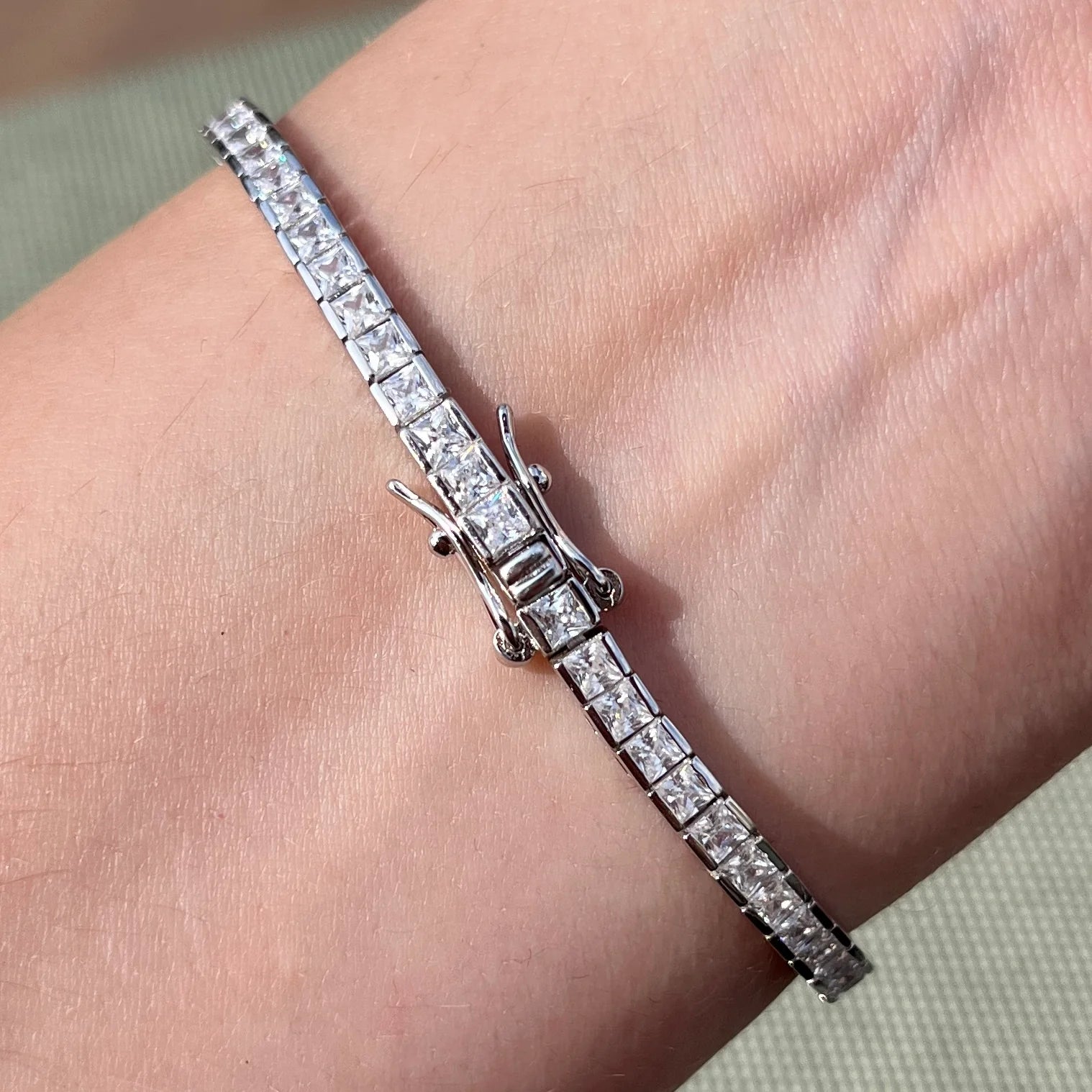 PRINCESS CUT CHANNEL SET TENNIS BRACELET