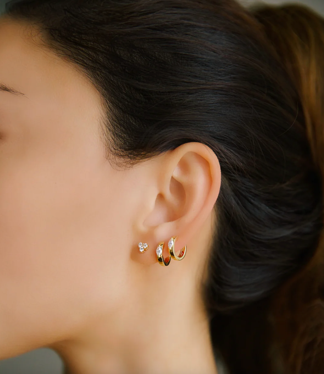 HUGGIES WITH MARQUISE DIAMOND CENTER