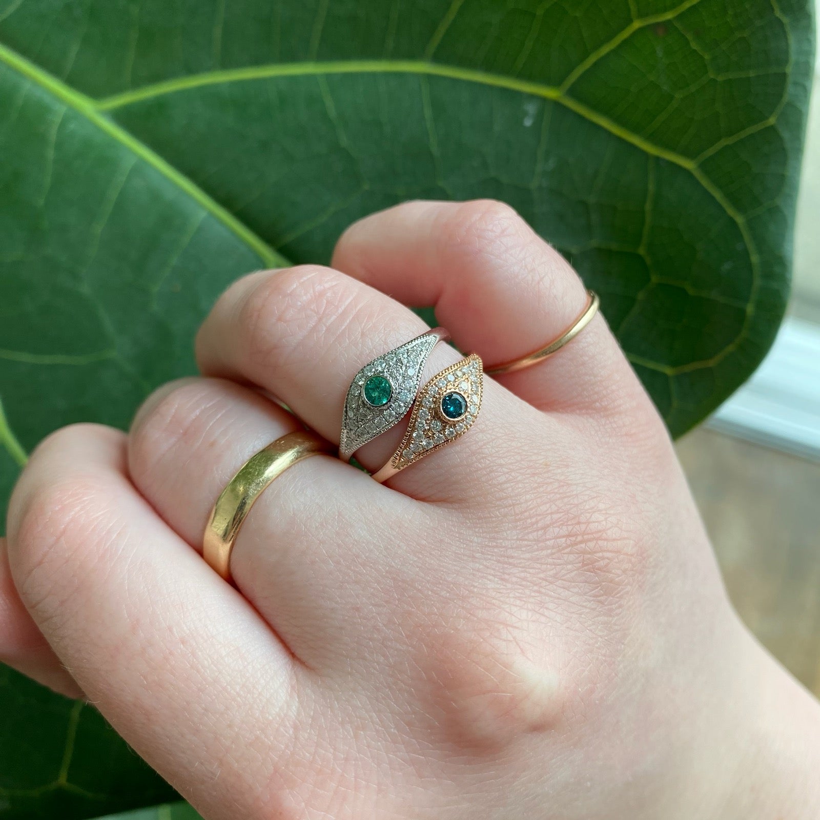 PAVE EYE RING WITH BLUE DIAMOND CENTER